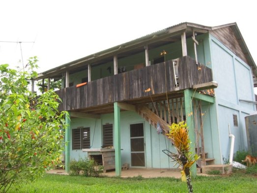 Two-story houses in Belize with both an inside and an outside stairway are very popular.  This house was built by two men with no previous experience.  (Photo by Joan Fry)